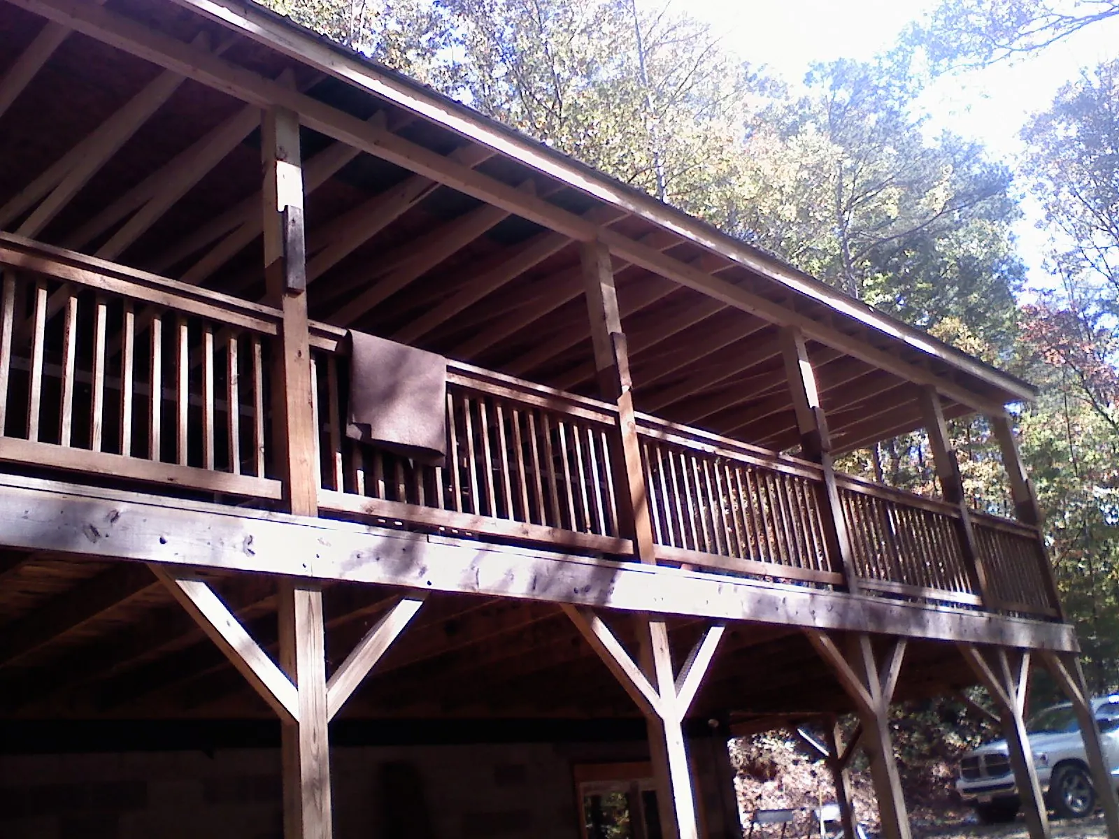 Timber framing under a new elevated porch and deck — Roof Leak Repair in Constantine by Roofing Brothers